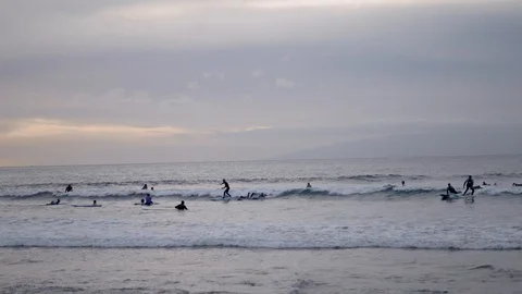Beautiful cloudscape over the ocean, surfer spot, summer time Stock Footage 106235650