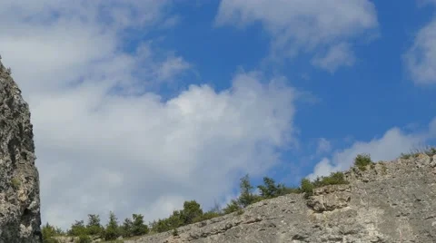 Beautiful Cloudscape Over Rocks Video stock 64481463