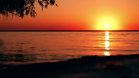 Beautiful cloudscape over the sea, bright orange sunset time lapse Stock Footage 255073962