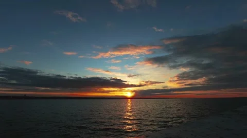 Beautiful cloudscape over the sea, sunset time lapse shot. Stock Footage 197112765