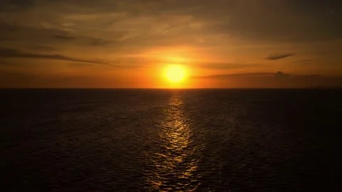 Beautiful cloudscape over the sea, sunset time lapse shot. Drone aerial view Stock Footage 234055007