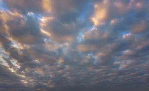 Beautiful cloudscape at sunset Stock Photos
