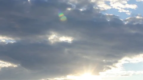 Beautiful cloudscape with sunset rays Stock Footage 77759518