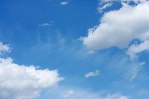 Beautiful cloudscape with various cloud types on the background of blue sky Stock Photos