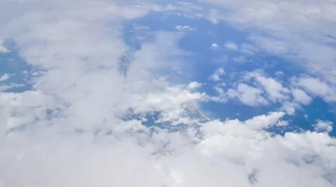Beautiful cloudy and blue sky, view from flying airplane. Stock Footage 68708404