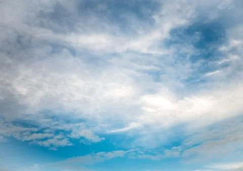 Beautiful cloudy blue sky background Stock Photos