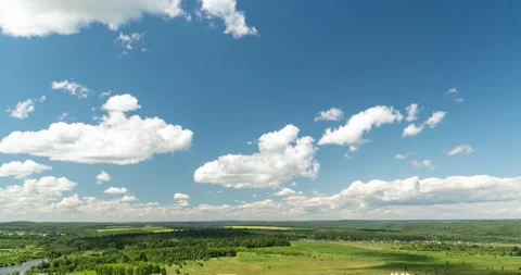 Beautiful cloudy landscape in summer time lapse. Blue sky with clouds 4K Stock Footage 136279009