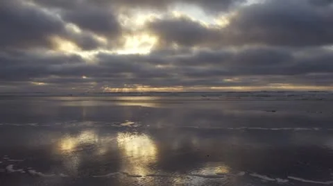 Beautiful Cloudy Reflective Beach Sunset Wide Stock Footage 22225685