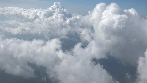 Beautiful cloudy sky. Fluffy сumulus clouds illuminated by sunlight passing by Video stock 89822787