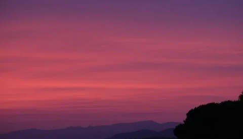 Beautiful cloudy sky horizontal background at summer evening. Stock Photos