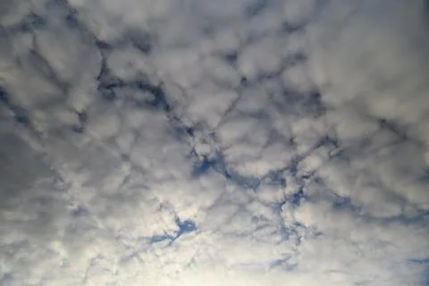 A Beautiful Cloudy Sky Showcasing Dynamic Patterns that Captivate the Eye and In Stock Photos