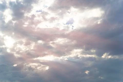 Beautiful cloudy sky with sun rays Stock Photos