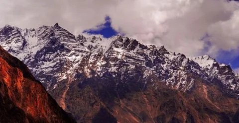 Beautiful cloudy sunrise in the mountains Stock Photos