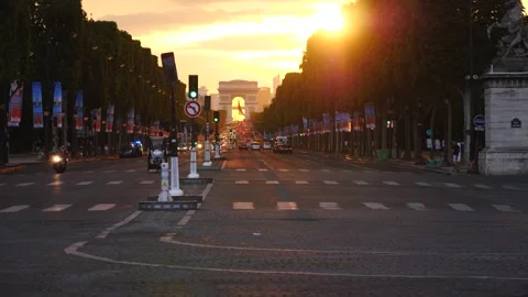 Beautiful cloudy sunset over Arc de Triomphe in Paris, France with traffic Stock Footage 237924353