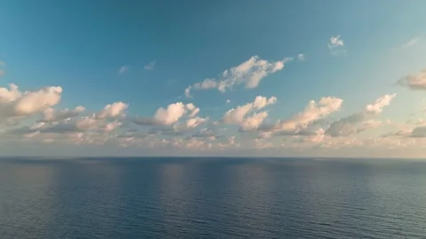 Beautiful cloudy sunset over the sea aerial view 4K Stock Footage 224277102