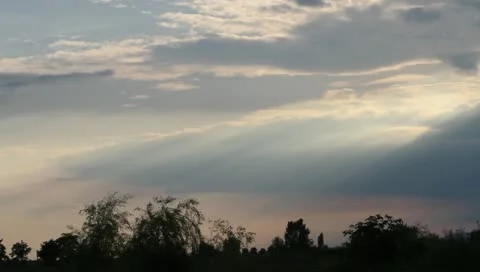 Beautiful cloudy sunset with sun rays Stock Footage 11275244