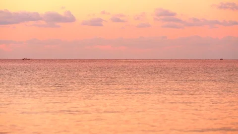 Beautiful cloudy sunset with sunset reflection on the sea surface 스톡 동영상 122695386