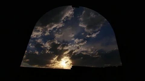 Beautiful Cloudy Sunset Through Window Arch Stock Footage 53202877