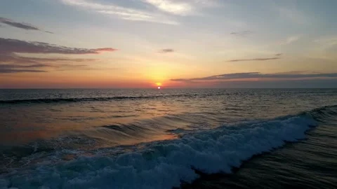 Beautiful cloudy sunset with an upper view at the beach Stock Footage 145153743