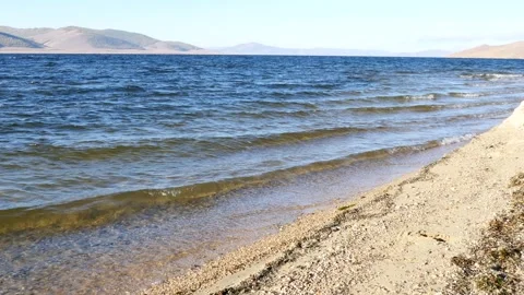 Beautiful cold turquoise waves of a Mongolian lake. Stock Footage 285183405
