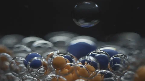 Beautiful colored bubbles in a liquid on a black background. Close-up. Slow 動画素材 97852545
