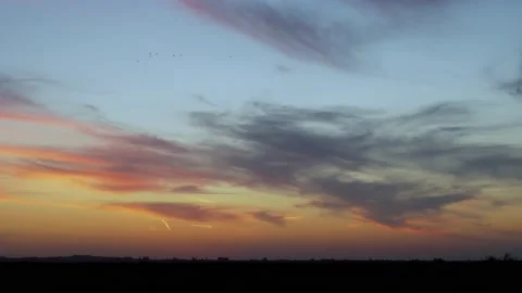 Beautiful Colored Sunset in the Timelaps Field. Colorful Sunset of the Evening S Stock Footage 236577616