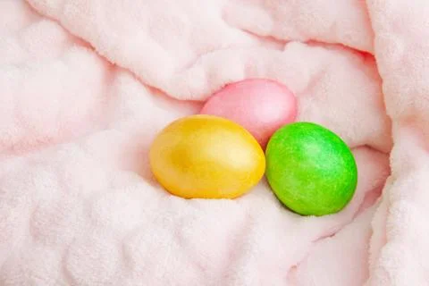 Beautiful colorful easter eggs. Easter concept on a soft plaid Stock Photos