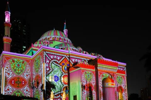 Beautiful colorful lights with Eastern patterns displayed on a mosque Stock Photos