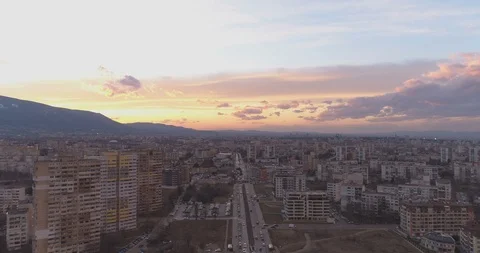 Beautiful colorful sunset clouds over peaceful neighborhood in Sofia, Bulgaria Stock Footage 125680926