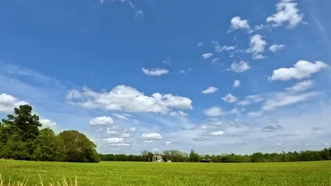 Beautiful colorful time-lapse Distant southern country home and spring landsc Stock Footage 180133086