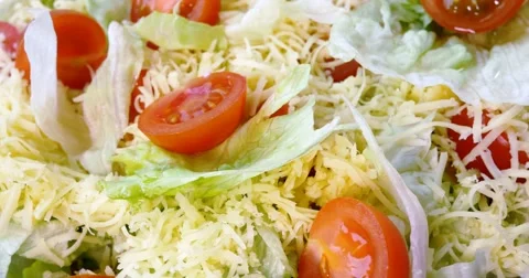 Beautiful colourful caesar salad with dressing croutons and parmesan cheese, hea Video stock 61963818