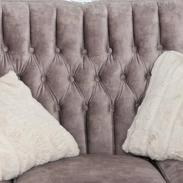 Beautiful, comfortable grey sofa with soft, light grey cushions, forms part.. Stock-Fotos