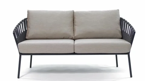 Beautiful comfortable sofa with light cushions and designer rope weave. Stock Footage 220218467