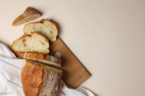 A Beautiful Composition of Artisan Bread Slices Presented on a light Background Stock Photos
