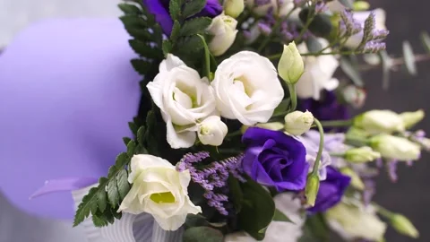 Beautiful composition, bouquet of white and blue roses. Close up. Copy space Stock Footage 244542053