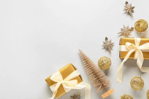 Beautiful composition with gift boxes, golden Christmas balls and decorative  Stock Photos