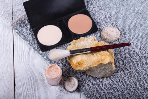 Beautiful composition: professional make-up brushes and tools, decorative ele Stock Photos