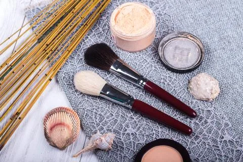 Beautiful composition: professional make-up brushes and tools, decorative ele Stock Photos