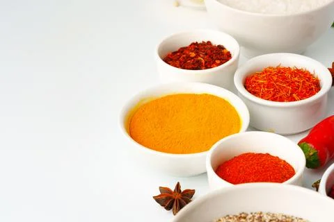 Beautiful composition with various spices on white background Stock Photos