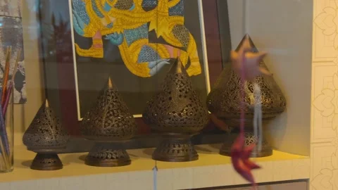 Beautiful cone shaped vases of different size and intricate Khmer carving Stock Footage 318664295