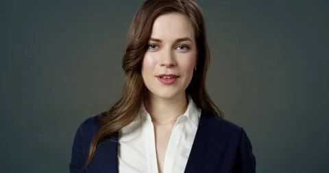 Beautiful Confident Young Brown-haired Woman Looking at Camera Posing. Close-up Stock Footage 155169765