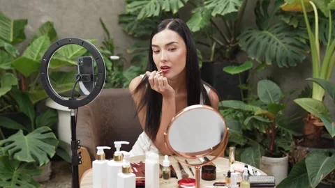 Beautiful content creator making natural beauty and cosmetic tutorial. Blithe Video stock 278008028