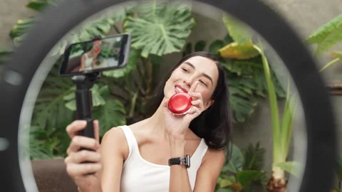 Beautiful content creator making natural beauty and cosmetic tutorial. Blithe Stock Footage 278932596