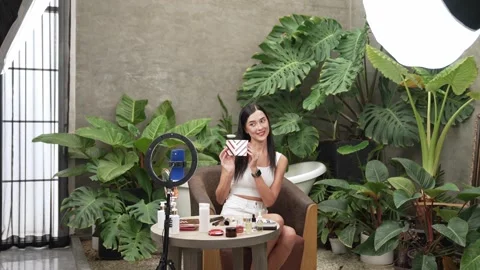 Beautiful content creator making natural beauty and cosmetic tutorial. Blithe Stock Footage 279021120