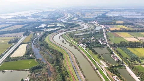 Beautiful Countryside River And Fields Rural Scenery 4K Aerial Stock Footage 320521449