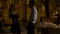 Beautiful couple cuddling and kissing tenderly in park, evening date, love 4k or 4k+ Resolution