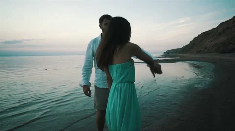 Beautiful couple dancing on river beach , sundown 스톡 동영상 68935006