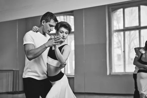 Beautiful couple dancing tango Stock Photos