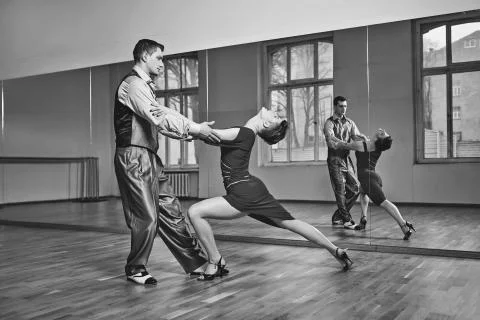 Beautiful couple dancing tango Stock Photos