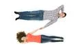 The beautiful couple lay on the white background. View from above Photo